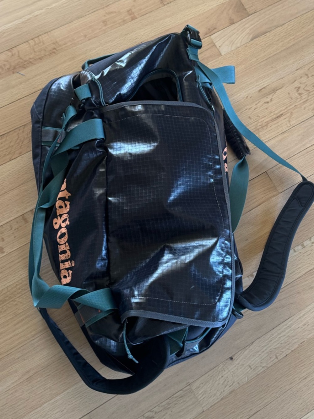 Patagonia BlackoleDuffel Bag with Teal Straps